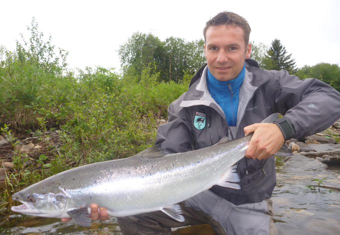 Daniel with a fresh and sea-liced salmon about 7kg.